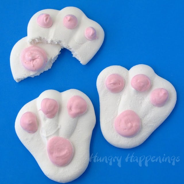 two whole marshmallow bunny feet and one foot torn in half.
