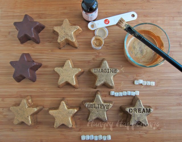 brush gold luster dust over chocolate fudge stars before imprinting with letter stamps. 