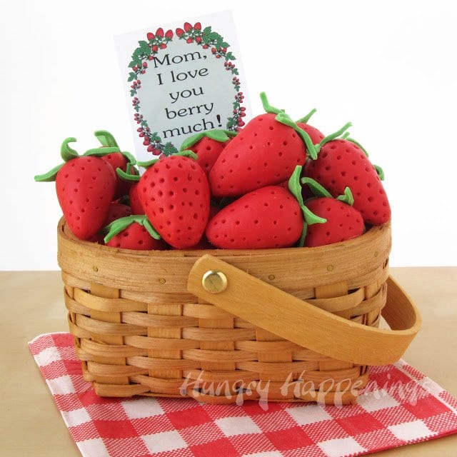 sweet modeling chocolate strawberries in a basket with a Mother's Day tag that says, "Mom, I love you berry much!"