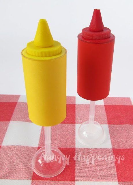 one yellow mustard push-pop and 1 red ketchup push-pop.