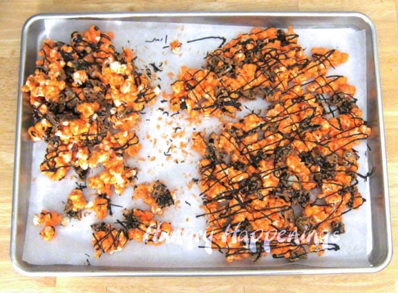 freeze then break the orange and black popcorn into small bite-sized pieces