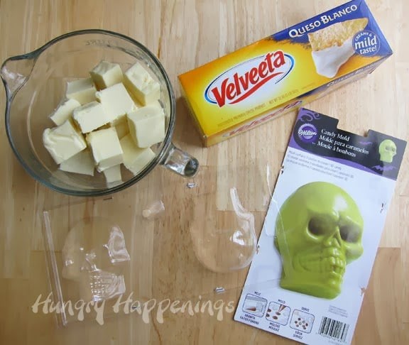 Velveet Queson Blanco in a box and cut up into cubes in a bowl with a plastic skull mold. 