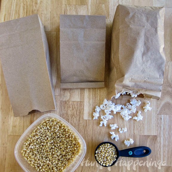 making popcorn in paper bags in the microwave. 