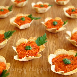 Fried won ton flowers filled with roasted red pepper pesto
