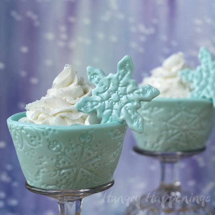 Add a little extra pizazz to your holiday cupcakes and make them look like you just picked them up from being in the snow. These Shimmering Snowflake Cupcake Wrappers will cool off these delicious hot desserts.