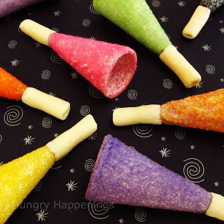 New Year's Even white chocolate and sugar-coated sugar cone party horns.