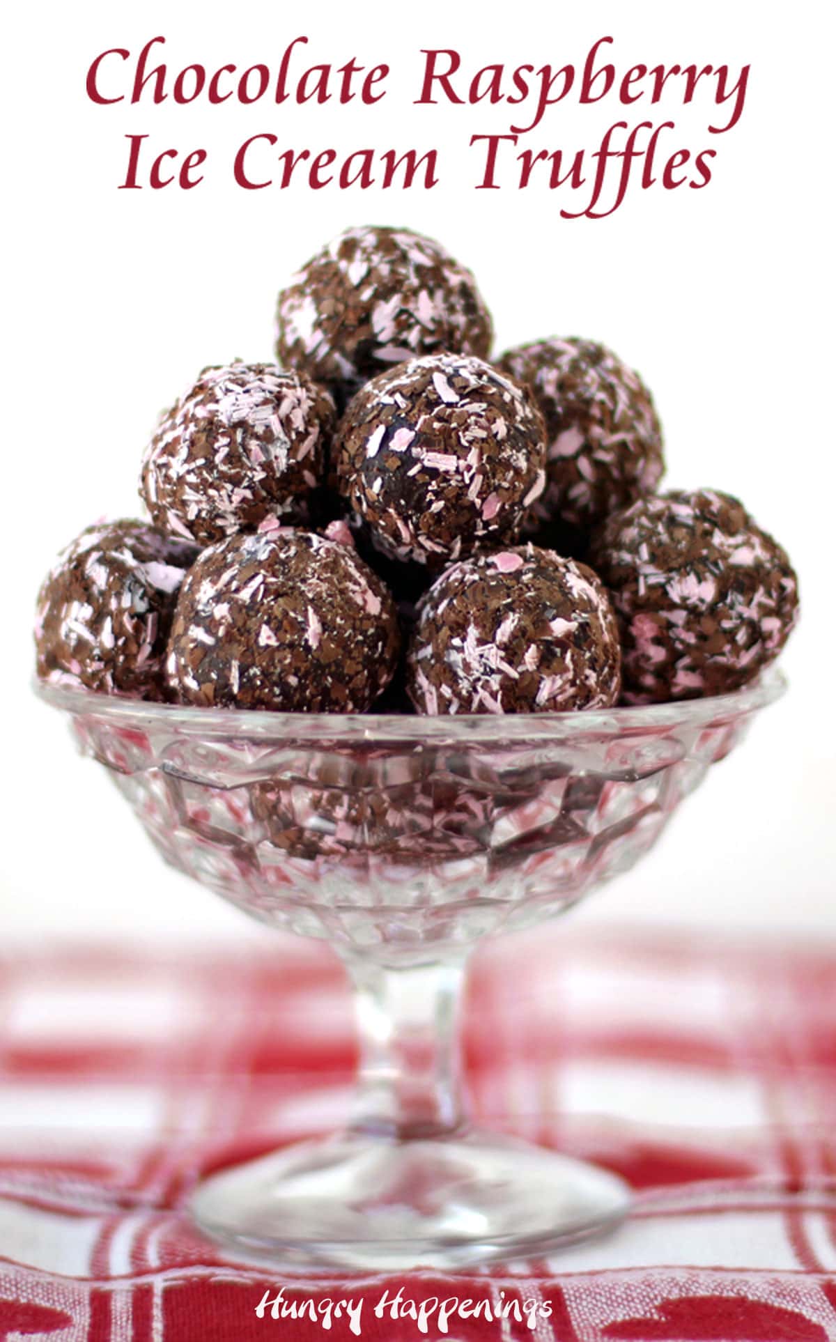 chocolate raspberry ice cream truffles in a clear candy dish