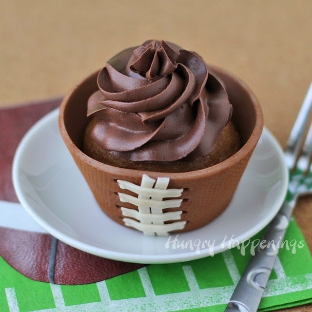 Football Cupcakes wrapped in an edible cupcake wrapper. 