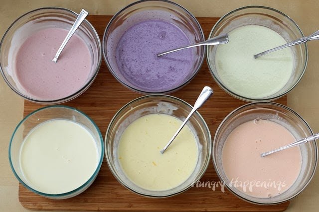 Coloring cheesecake filling using raspberry, blueberry, lemon, carrot and orange puree. 
