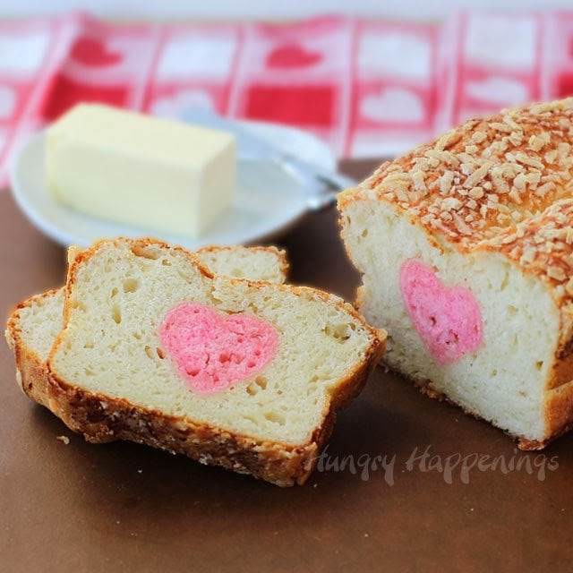 Surprise your loved ones when they slice a piece of this Parmesan Crusted Heart Reveal Bread. They will be impressed by your skills and will be overwhelmed when they take a bite and see how delicious and soft the bread is.