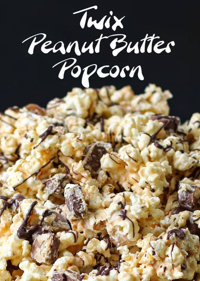 This Peanut Butter Candy Coated Popcorn Speckled with Twix Bites is the perfect Movie Night Snack. It's crunchy and creamy and salty and sweet and loaded with caramel filled chocolate candies. 