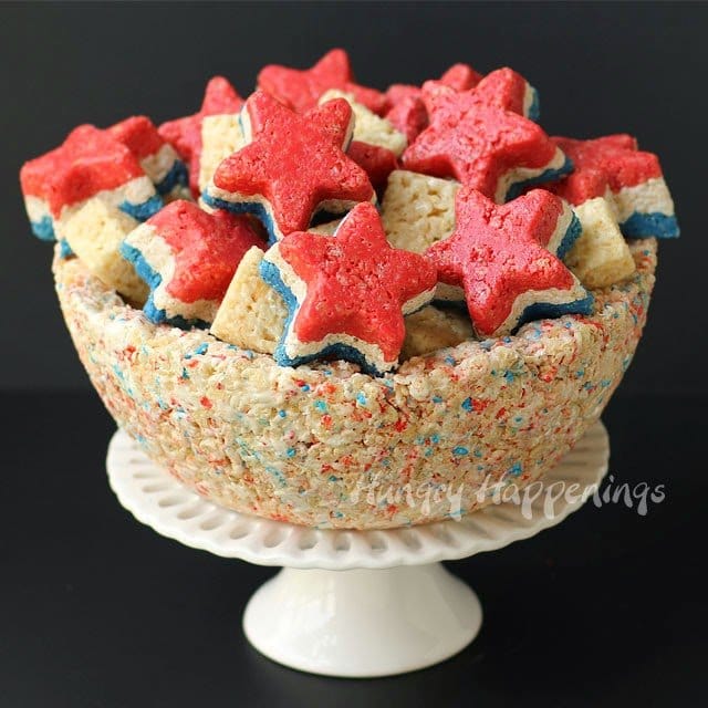 red, white, and blue rice krispie treat stars served in a large rice krispie treat bowl.