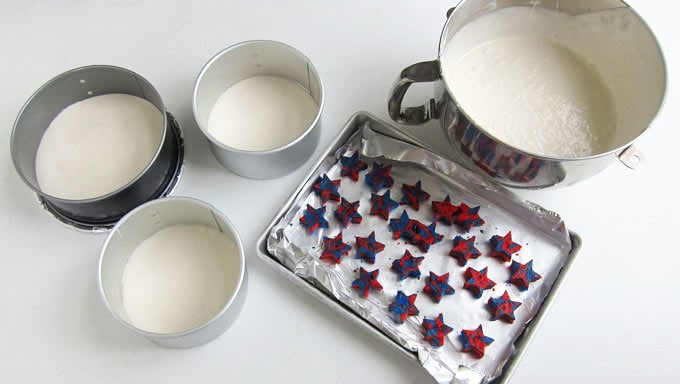 fill 3 round cake pans with white cake batter before adding the cake stars