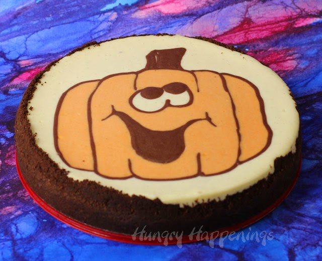 Happy Jack-o-Lantern Cheesecake | HungryHappenings.com