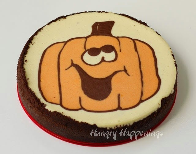 Halloween Pumpkin Face Cheesecake | HungryHappenings.com