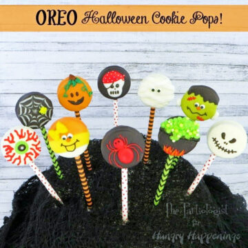Halloween OREOs cookie pops including a pumpkin, mummy, eyeball, candy corn, spider web, cauldron, skeleton, and more.