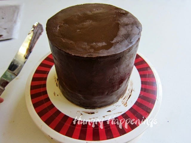 3-tier chocolate frosted round cake. 