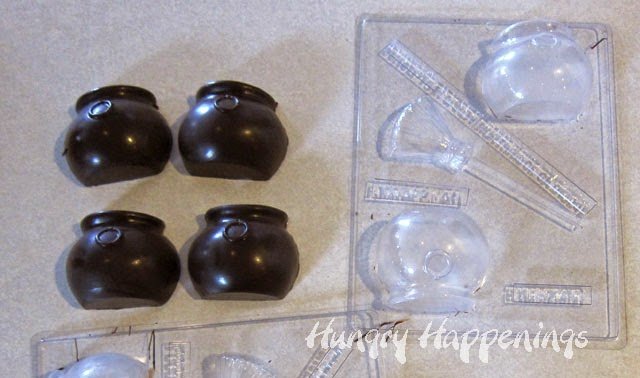 Make a chocolate cauldron in a candy mold