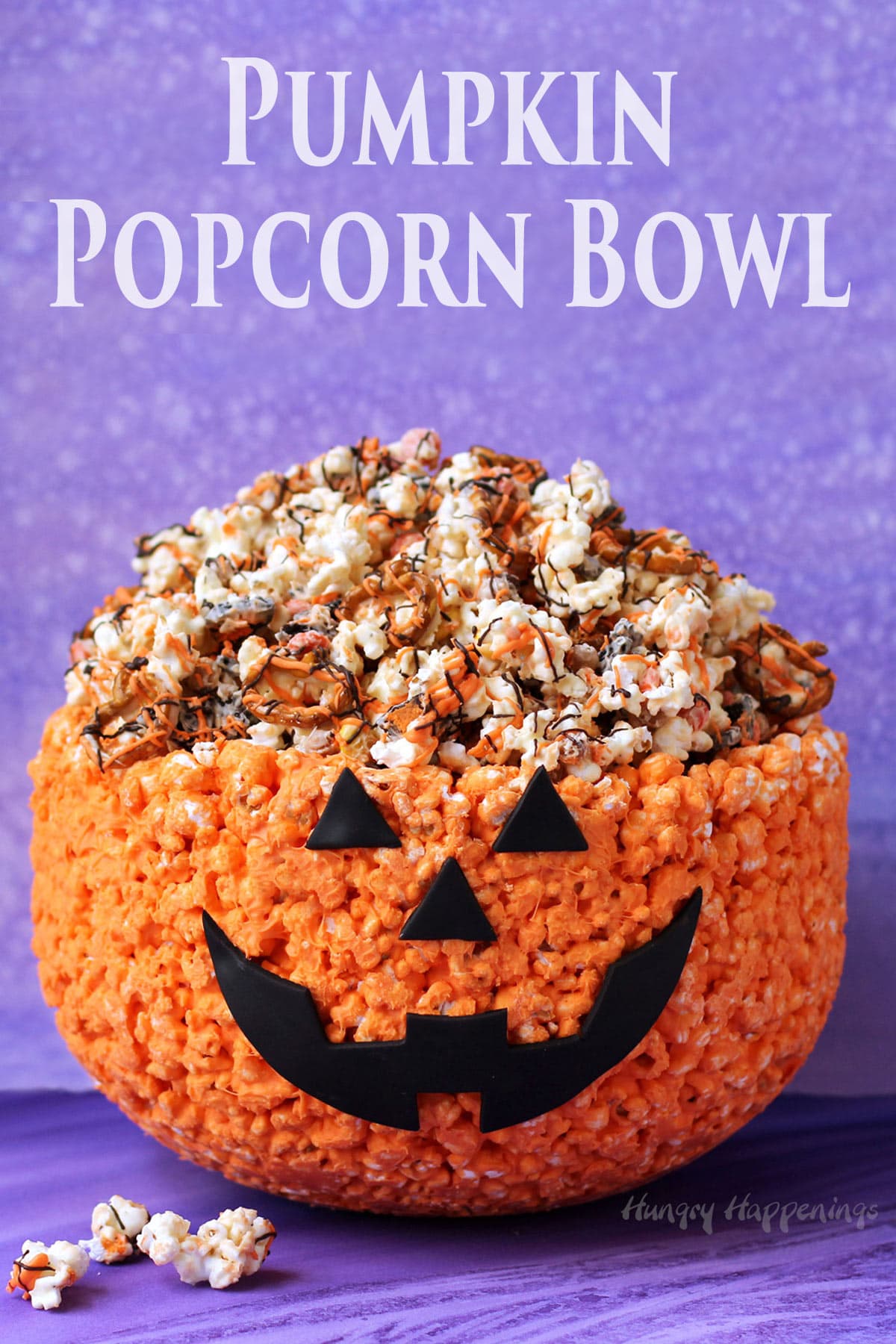Pumpkin Popcorn Bowl filled with Halloween popcorn.