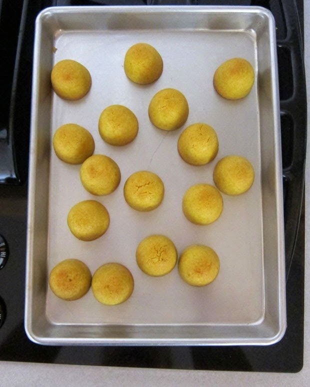 baked yellow dome-shaped cookies. 