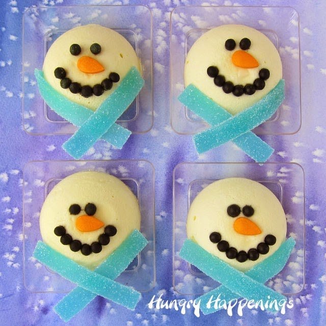 I made a batch of these Mini Cheesecake Snowmen for my cheesecake loving family over Thanksgiving weekend and served them for dessert. I wanted to get a few projects created ahead of time because I knew I had a jam packed schedule this month and no one complained about having snowmen invade Thanksgiving.