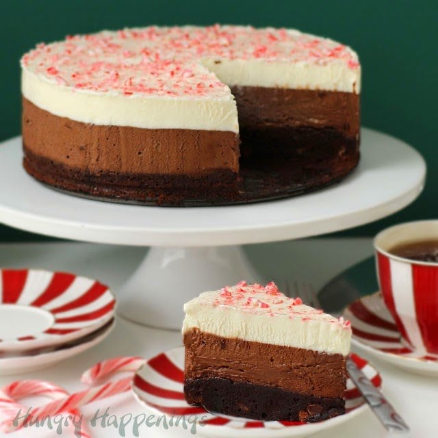 Gluten free triple chocolate mousse cake topped with crushed candy canes
