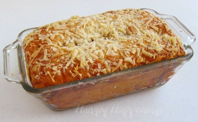 baked pepperoni bread topped with Parmesan cheese. 