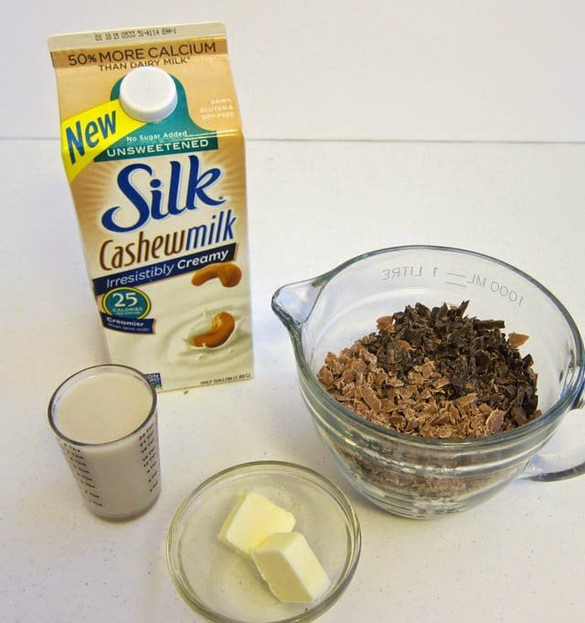 cashew milk ganache ingredients including cashew milk, butter, dark chocolate, and milk chocolate