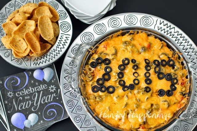 New Year's Eve party food ideas - Taco Dip from HungryHappenings.com