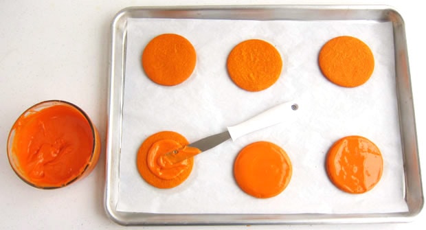frost round orange cookies with orange candy melts to create basketball cookies