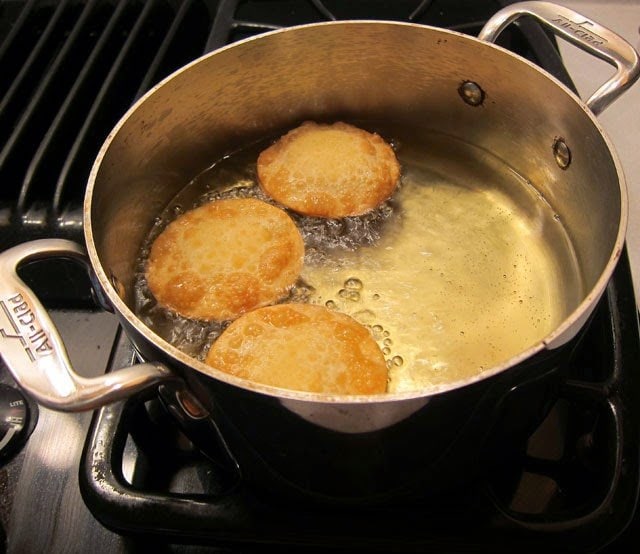 frying pepperoni won tons in a pot of oil. 