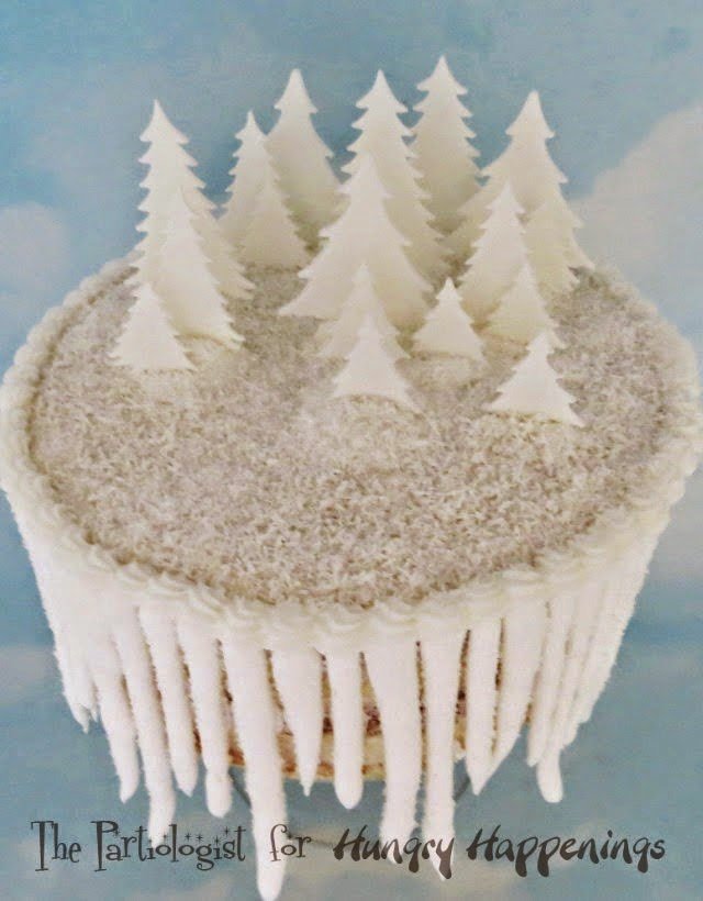 Coconut Icicle Cake - See how to transform homemade coconut cake with coconut buttercream into this winter wonderland by The Partiologist for HungryHappenings.com