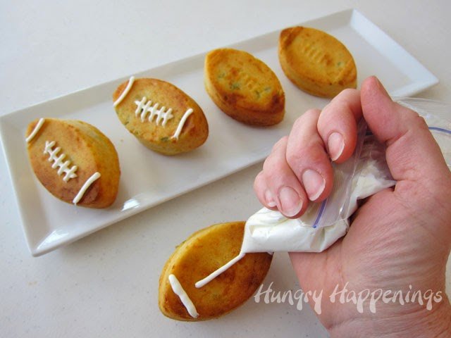 Football Shaped Corn Bread filled with Jalapeños and Cheddar Cheese | HungryHappenings.com