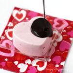 dairy-free strawberry mousse hearts topped with dairy-free chocolate ganache