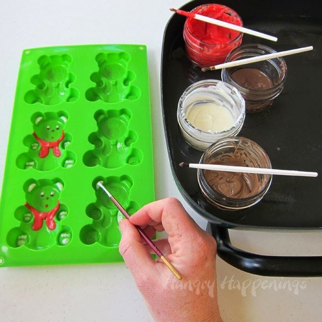 How to hand paint candy coating into silicone teddy bear molds - HungryHappenings.com
