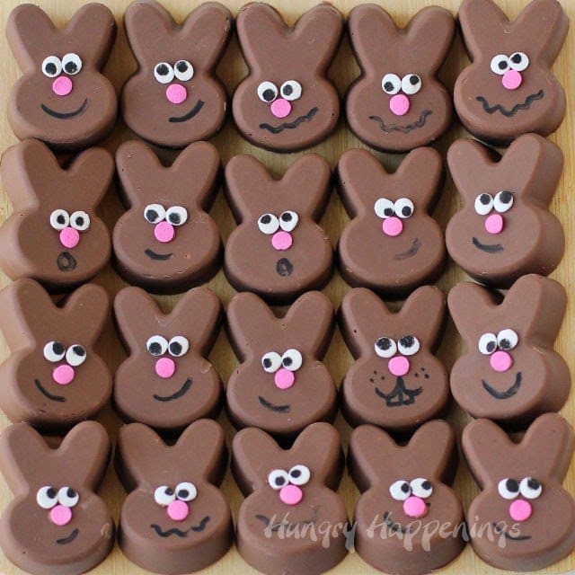 20 Reese's Fudge Bunnies in rows on a wooden cutting board. 
