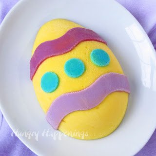 Hand paint Easter Egg Cheesecakes. If you can color in a coloring book, you can make these festive Easter eggs. 