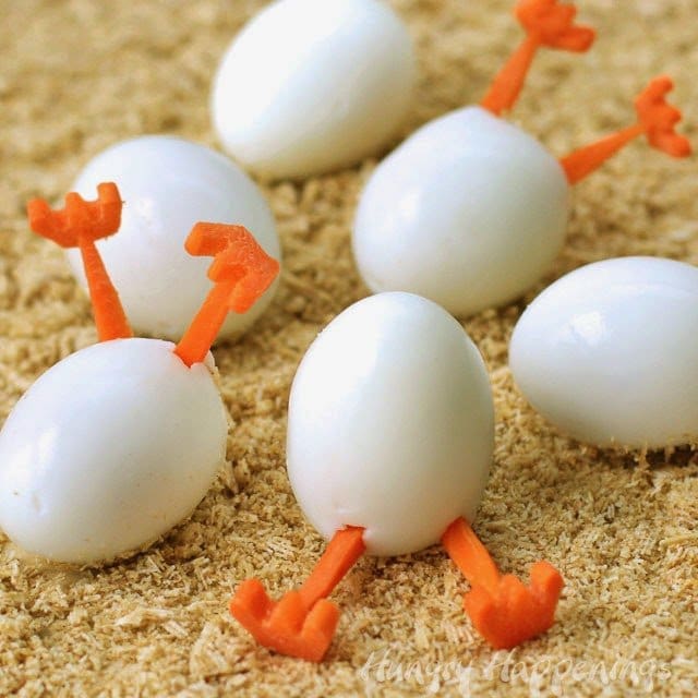 These simple to make Hatching Chick Hard Boiled Eggs will crack up your family this Easter. Tutorial at HungryHappenings.com