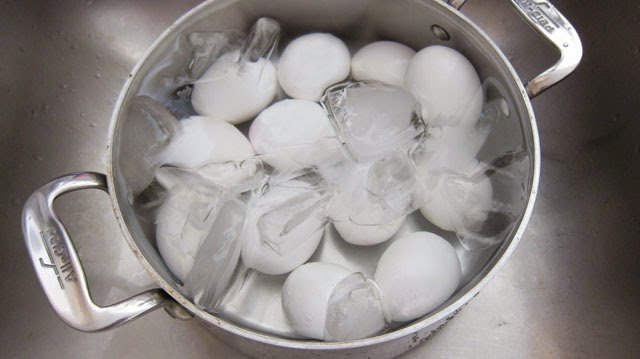 Shock hard boiled eggs in ice water for easy peeling. 