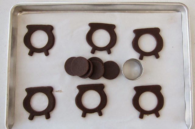 chocolate pot of gold cookies with circular holes cut out from the centers