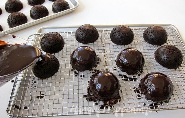 How to cover mini cakes with chocolate Cherry Coke ganache