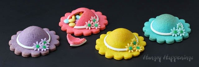four ladies hat cookies on a black background