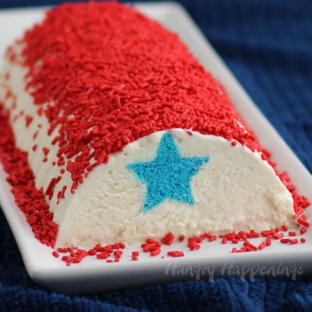 Keep cool this 4th of July by enjoying a slice or two of this Red, White, and Blue Ice Cream Roll. You'll get cake, ice cream and sprinkles in each slice. Recipe from HungryHappenings.com