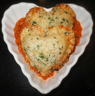 Mozzarella cheese filled pie crust hearts. 