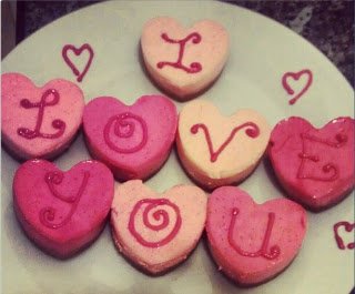 pink heart-shaped cheesecakes decorated with "I Love You".