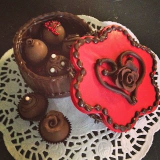chocolate box with a heart on top. 