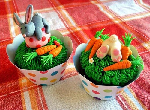 bunny butt cupcakes with modeling chocolate bunnies, carrots, and Easter egg. 
