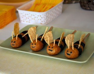 corn dogs decorated like bumble bees.