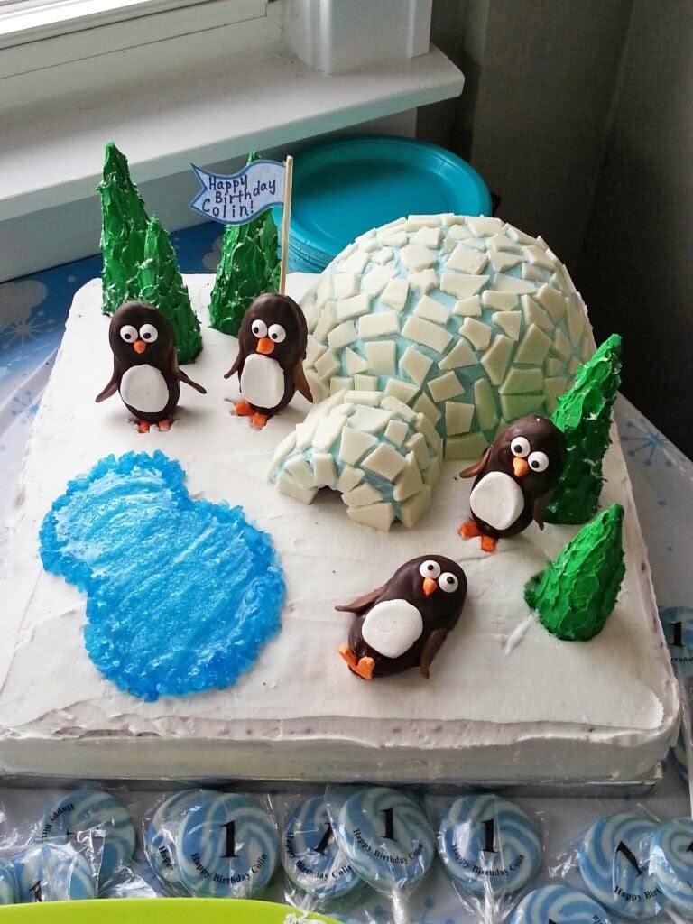 Winter cake with Nutter Butter penguins and an igloo.