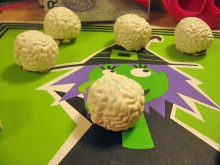 white chocolate brains on a witch plate. 